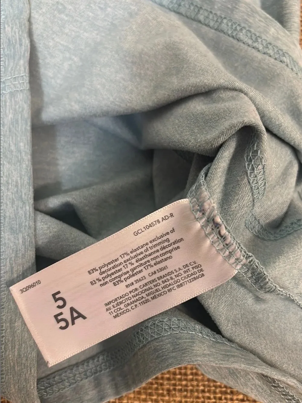 OshKosh Active Long Sleeve Active Top in a light blue heathered color.